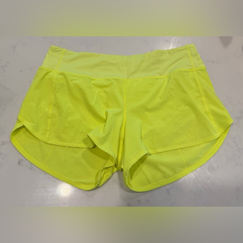 Lululemon Speed Up Mid-Rise 4” Lined Shorts in highlighter yellow